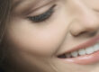 Woman Smiling, can you turn dentures into implants